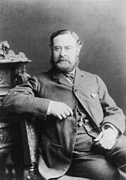 Portrait photograph of Henry Spencer Ashbee by H. T. Reed, 1889