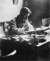 W. W. Denslow (1856–1915) at his desk in 1900