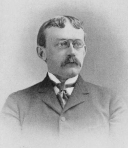 Portrait of Morris Hicky Morgan (1859–1910) from Universities and Their Sons, Volume II, 1899, page 374