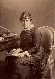 Photograph of Kate Greenaway. Albumen cabinet card, 1870s. 5 5/8 in. x 3 7/8 in. 142 mm x 99 mm.