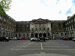 St Thomas Street, Southwark. Founded in 1704 by Thomas Guy. Designed by Sir Thomas Dance from 1721, the East Wing was added in 1738-41 by James Steere after Dance's death in 1733 and the West Wing was added in 1774-7 by R Jupp Junior who also added the the stone-faced frontispiece.