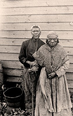 Sylvia Dubois poses with her daughter Elizabeth Alexander, circa 1883.