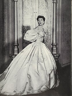 Gertrude Lawrence as Anna, from souvenir program for The King and I.  Lacks any copyright notice, so it's fair game.  Image can be found here