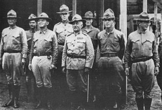 Four legendary Marine Officers photographed at Vera Cruz, Mexico in 1914. Front row, left to right: en:Wendell C. Neville; en:John A. Lejeune; en:Littleton W. T. Waller, Commanding; en:Smedley Butler.
