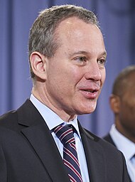 New York Attorney General, Eric Schneiderman, with Associate United States Attorney General, Tony West, at a press conference announcing a civil lawsuit against investment bank JPMorgan Chase.